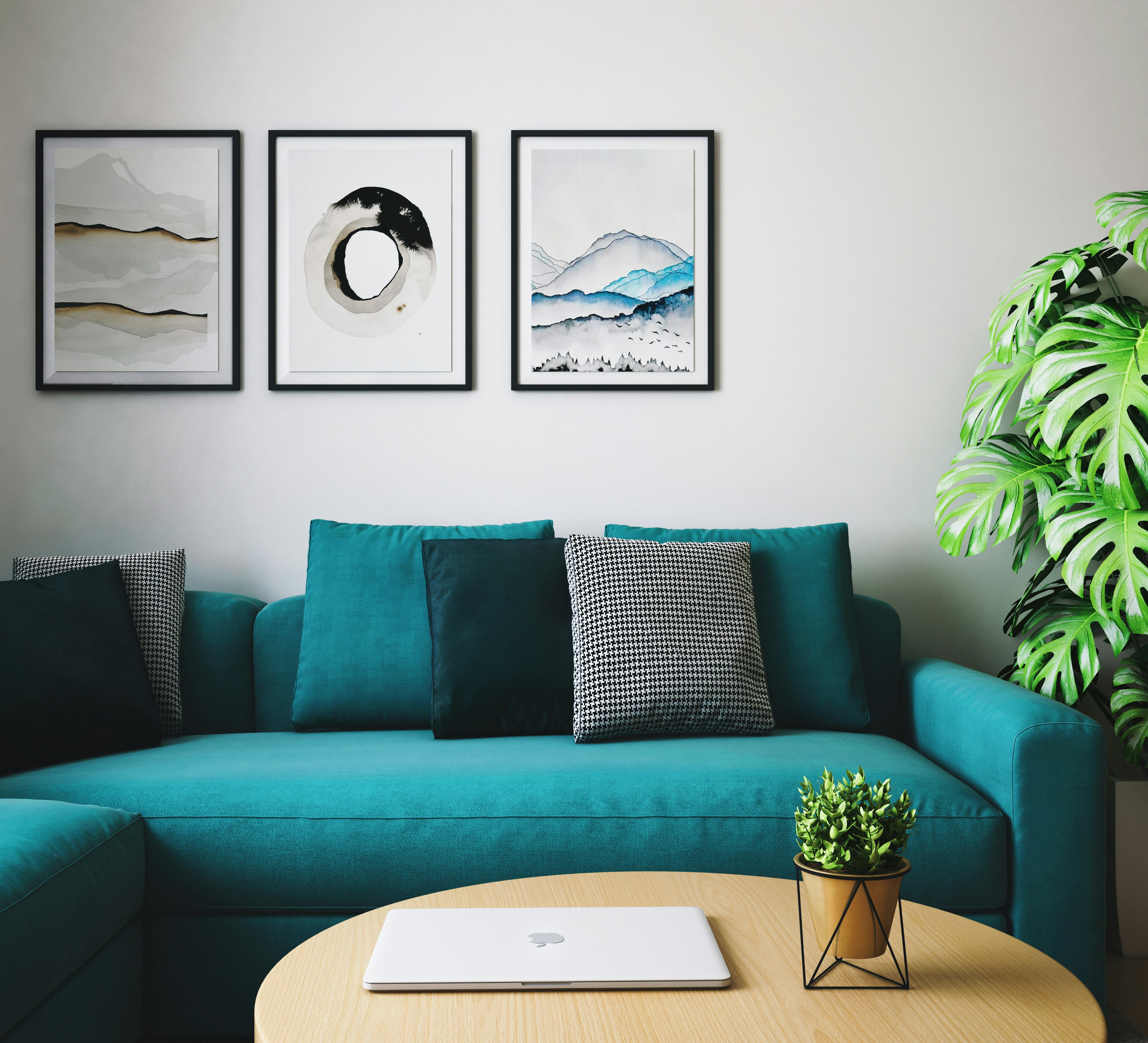black and white throw pillows on white couch